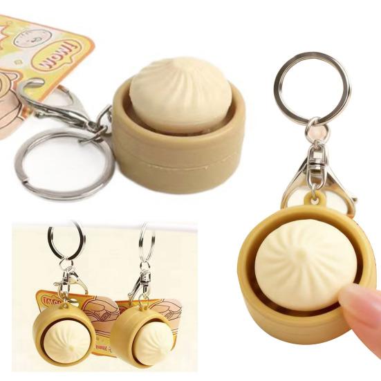 Gedämpfte Brötchen Schlüsselanhänger Quetschspielzeug mit Geräusch Niedlicher PVC Fidget zur Stressbewältigung Tragbares Dekompressions-Gadget für Kinder Erwachsene