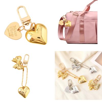 Modischer Herzanhänger Taschenanhänger Attraktiver herzförmiger Schlüsselanhänger-Anhänger mit Schleifenanhänger zur Taschendekoration