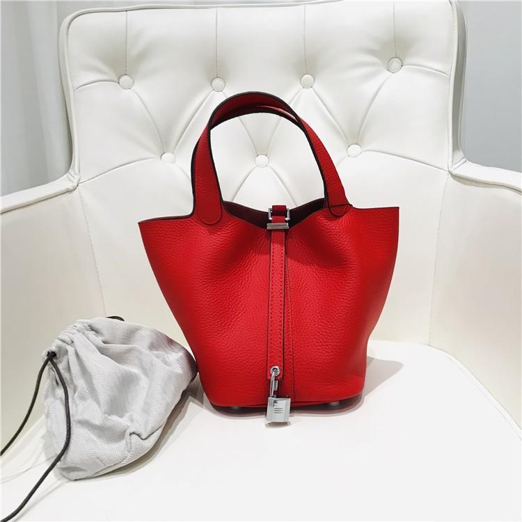 2023 Nowa damska torba ze skóry bydlęcej pierwszej jakości, wzór liczi, koszyk warzywny, worek typu bucket bag, modna i prosta, codzienna torebka