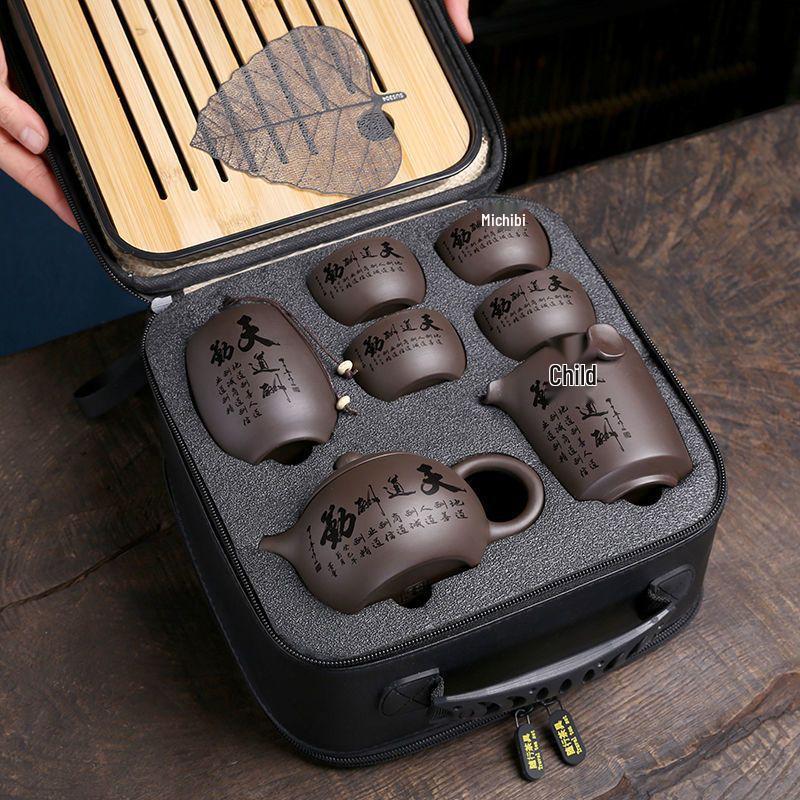 Zisha Travel Tea Set: Portable Xishi Pot with Quick-Brew Cup and Four Cups - Perfect for Outdoor or Home Tea Ceremonies.