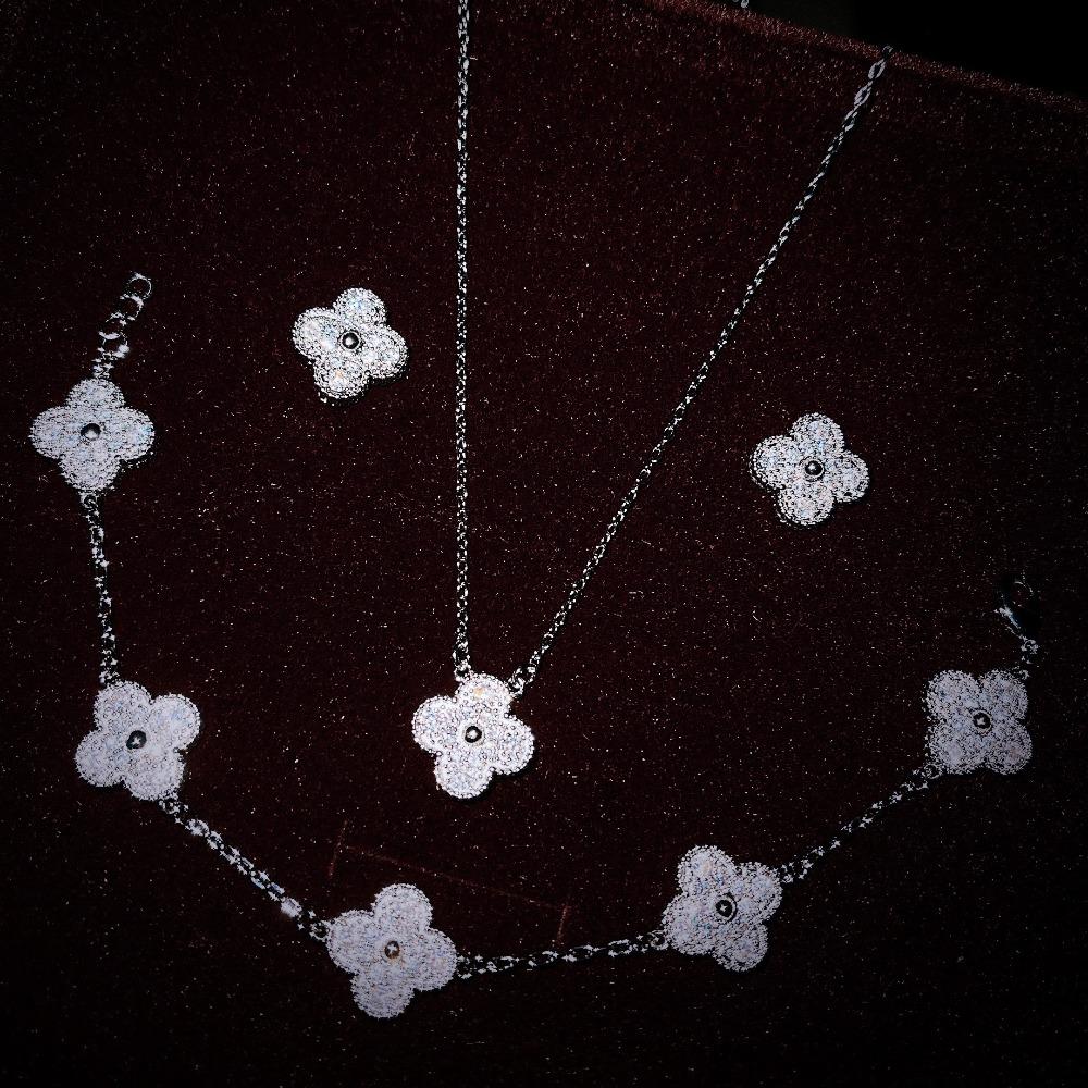 

Elegant Women Jewelry Set with Four Leaf Clover Pendant Necklace Long Chain Earrings Bracelet Full of Diamonds