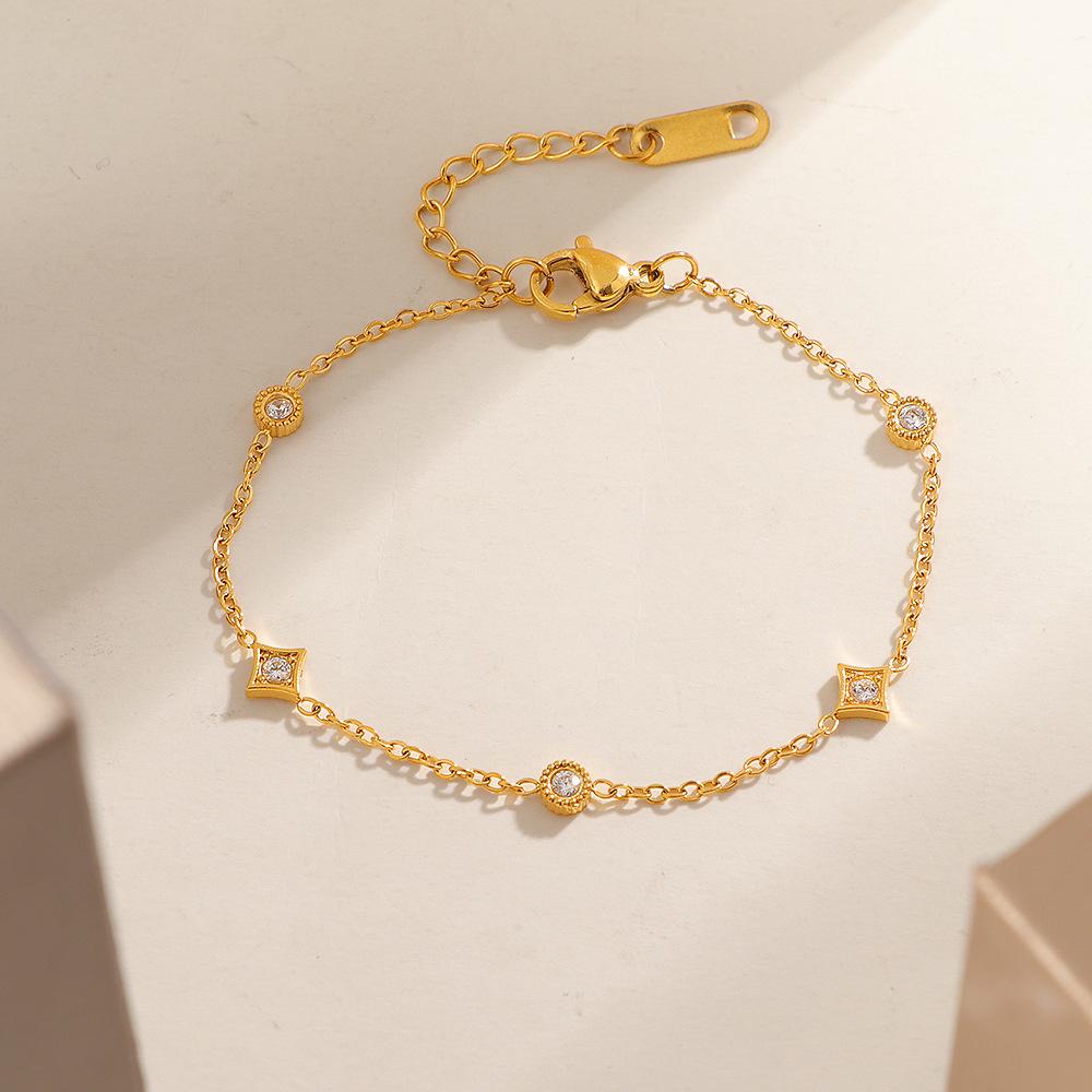 

Exquisite Women s Four-Prong Zircon Bracelet: Titanium Steel, 18k Gold-Plated, Japanese-Korean Design—Light Luxury Gift