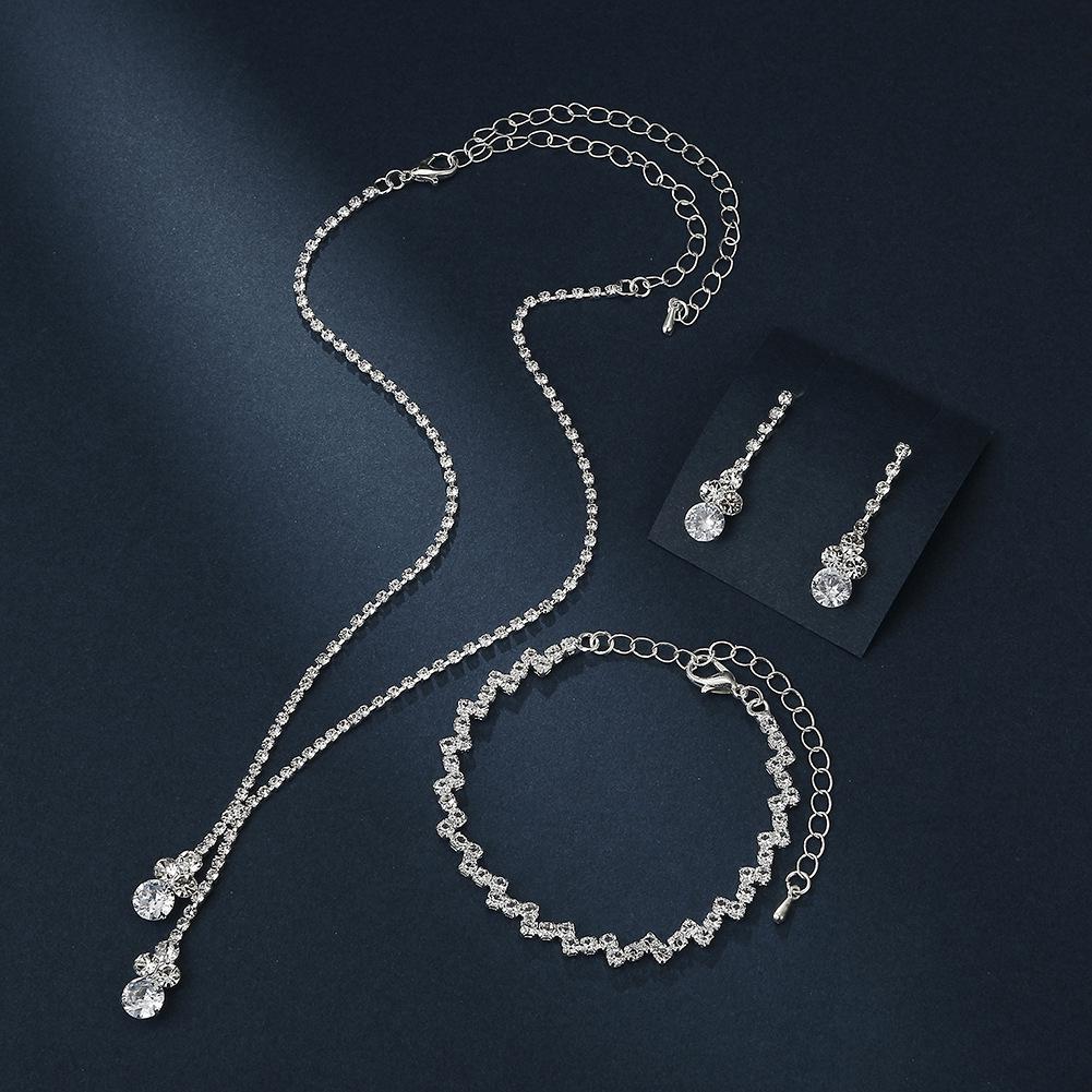 

Элегантный свадебный набор колье и серег с цирконами и стразами 493