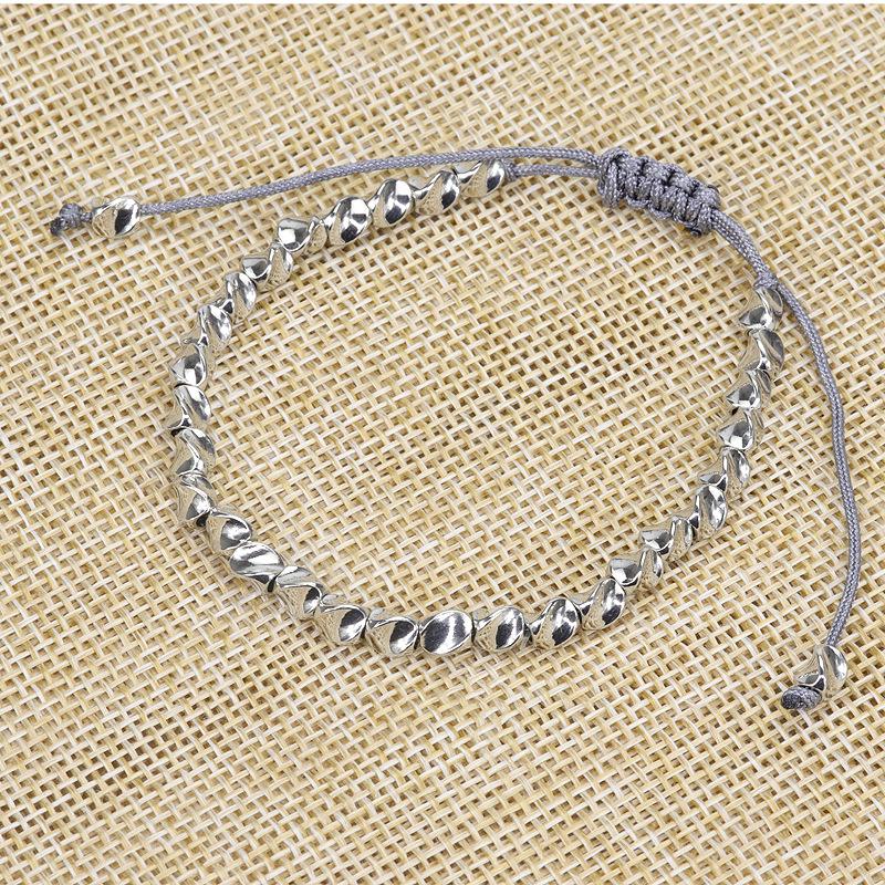 Handmade Woven Bracelet with Irregular Copper Beads and Creative Tassel Drawstring