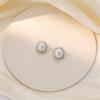 Beixi Silver Sunflower Stud Earrings: S999 Silver Needle, Shell Pearl, Rhinestones, Classic & Elegant Design.