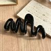 Fluid Wave Silhouette Hair Clip In Dreamy Translucent Hues Provides Secure Hold For Messy Buns And Modern Minimalist Updos