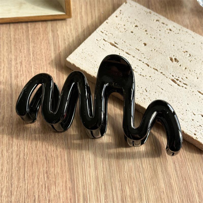 Fluid Wave Silhouette Hair Clip In Dreamy Translucent Hues Provides Secure Hold For Messy Buns And Modern Minimalist Updos