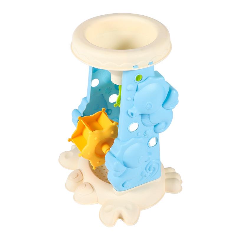 Complete Beach Toy Set: Includes Shovel, Wheelbarrow, Bucket, and Water Toys for Kids' Sand Play at the Seaside.