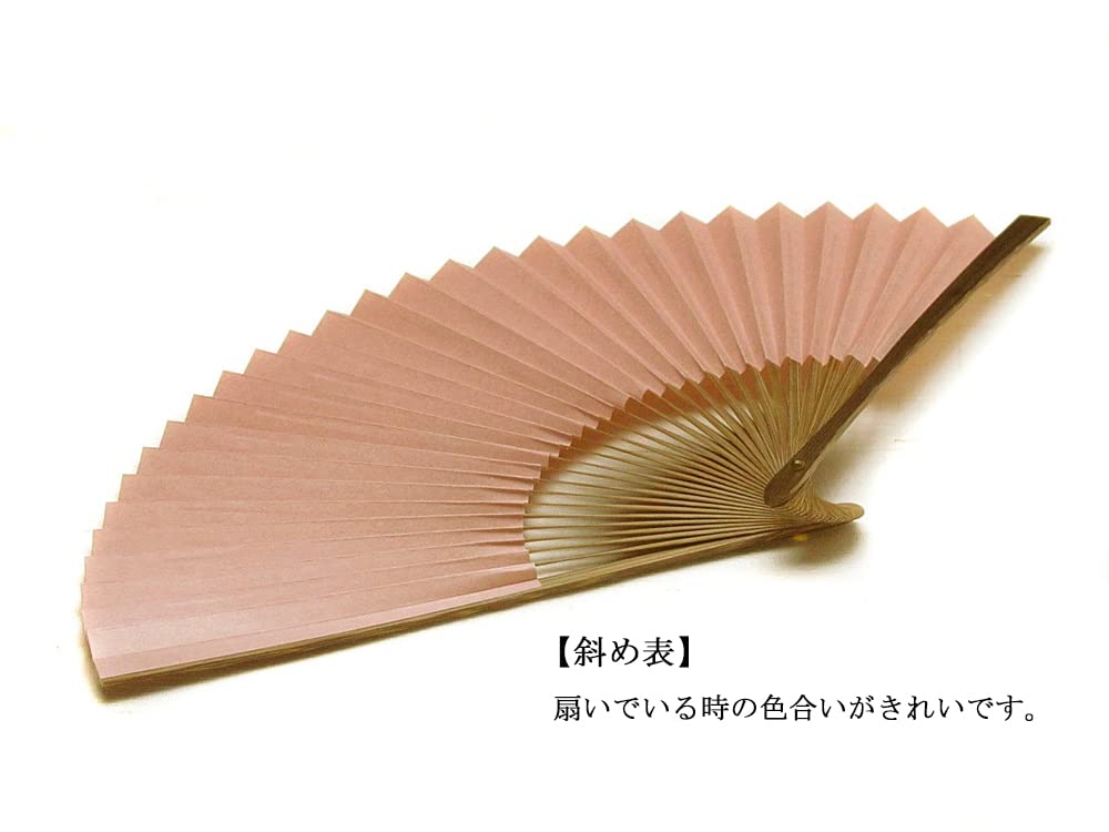 folding made with woven in a beautiful made in Japan in Handcrafted by with a traditional Japanese Features a Kyoto-style fan, paper, ibis-pink color.