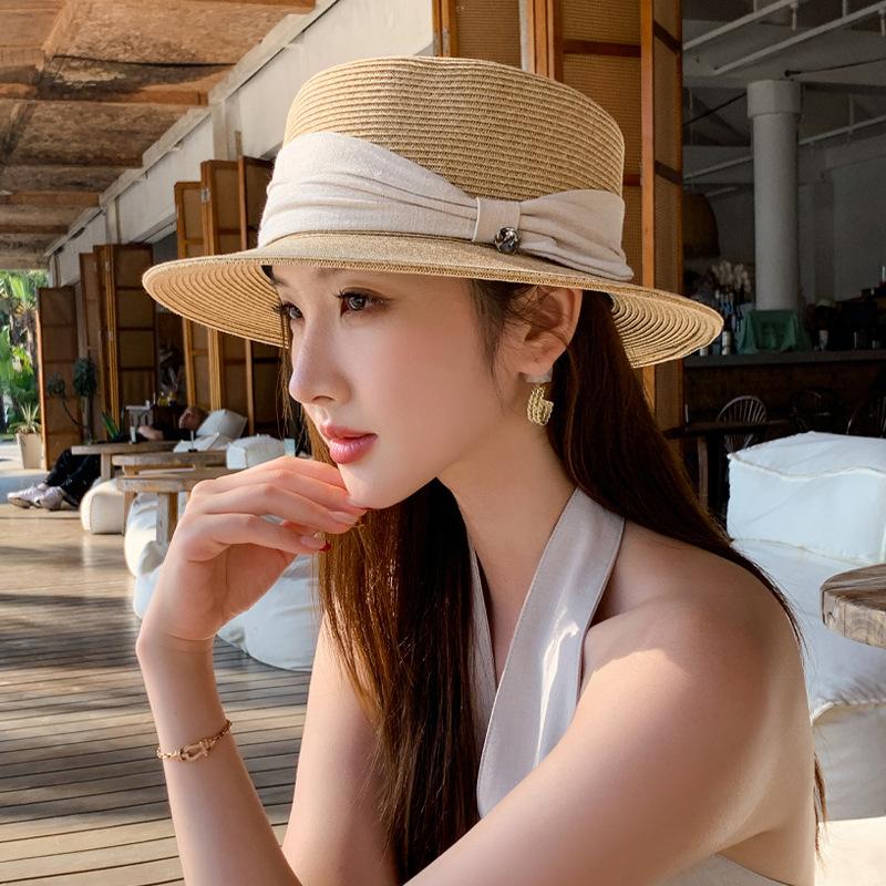 Taizhou Wenling hat women's summer French Hepburn style elegant straw straw hat seaside beach sunshade sunscreen hat