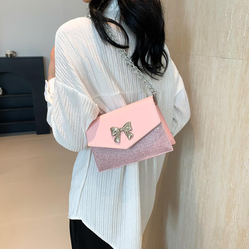 Modische Frühjahrs-Schmetterlingsknoten-Umhängetasche in eleganten Unifarben für einen trendigen Stil
