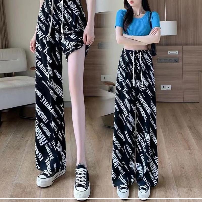 

2024 Повседневный Свободный Спортивный Стиль Модные Принтованные Брюки на Кулиске с Эластичной Талией Драпирующиеся Прямые Штанины Универсальные Брюки Палаццо из Ледяного Шелка S чёрный