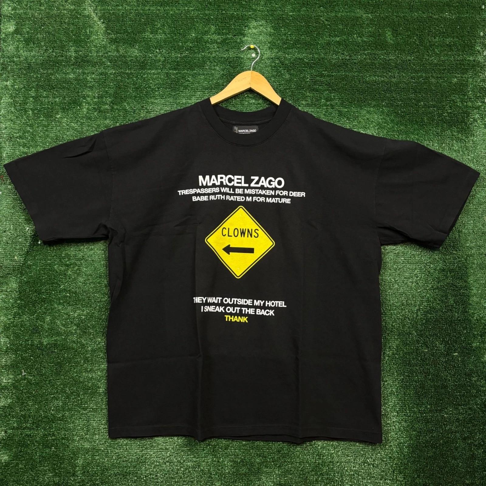

Marcel Zago Clowns Yellow Road Sign T-shirt Size 2XL M