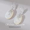 Exquisite Mother-of-Pearl Sterling Silver Luxury Earrings with Unique Face-Inspired Design
