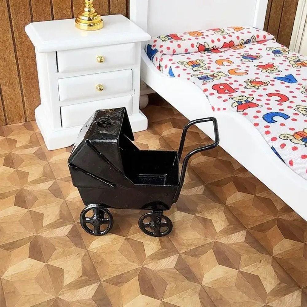 Schmiedeeiserne Mini-Wiege Kinderwagen Realistischer Puppenwagen Spielzeug Babykinderwagen Modell Kinder Rollenspiel
