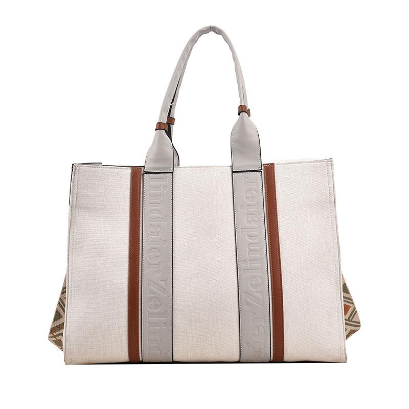 Commuter tote bag new large-capacity handbag women's 2025 broadband high-end sense work fashion messenger bag