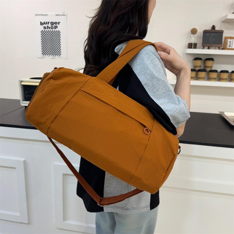 New large-capacity storage luggage bag, casual outdoor hand-held travel bag, multi-functional anti-splashing fitness yoga bag