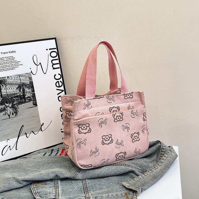 Neue Modehandtasche, schön, lässig, leichte und geräumige Handtasche, trendiger Cartoon-Druck, niedliche Aufbewahrungstasche