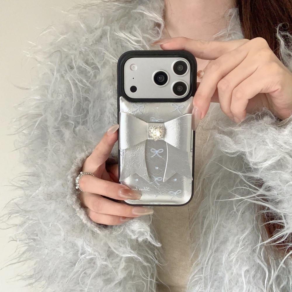 Korean ins silver leather three-dimensional bow, suitable for Apple 17 mobile phone case, new iPhone17promax high value 15 trend 14 flash diamond 13