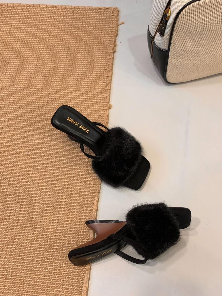 In the autumn and winter of 2025, the new European and American wedges with French square head open-toed fluffy slippers are worn outside women's sh