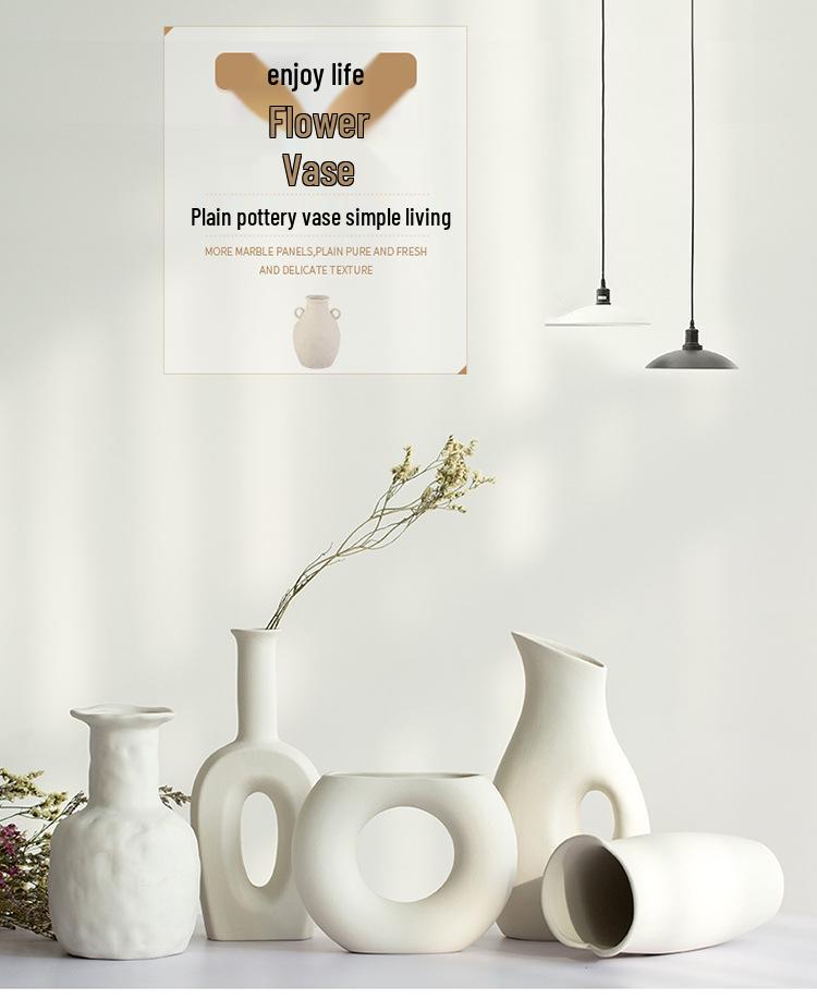 White Ceramic Vase with Dried Baby's Breath for Living Room or Dining Table Decoration