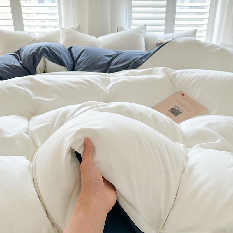 Solid Color Sanded Bedding Set: Four-Piece Set with Quilt Cover and Washed Spring Sheets.