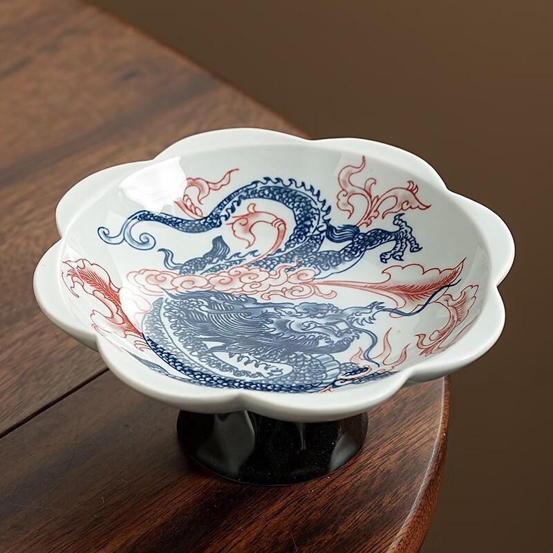 

Синьо-біла керамічна тарілка для закусок до чаю на високій ніжці