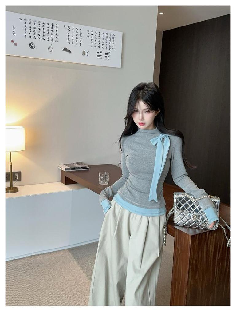 Elegante Top de Punto para Mujer con Cuello Alto y Lazo