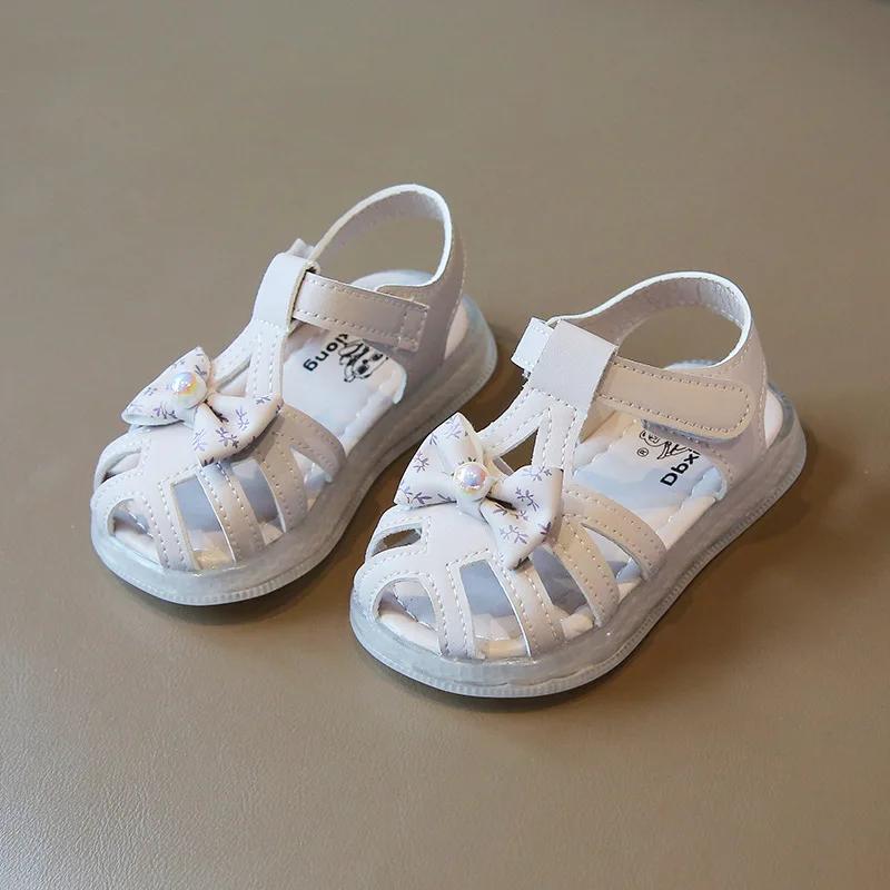 

Новые сандалии для девочек, летние, милые детские сандалии с бантиками, принцесса, первые ходоки, модные повседневные детские пляжные сандалии с вырезами 17 фиолетовый