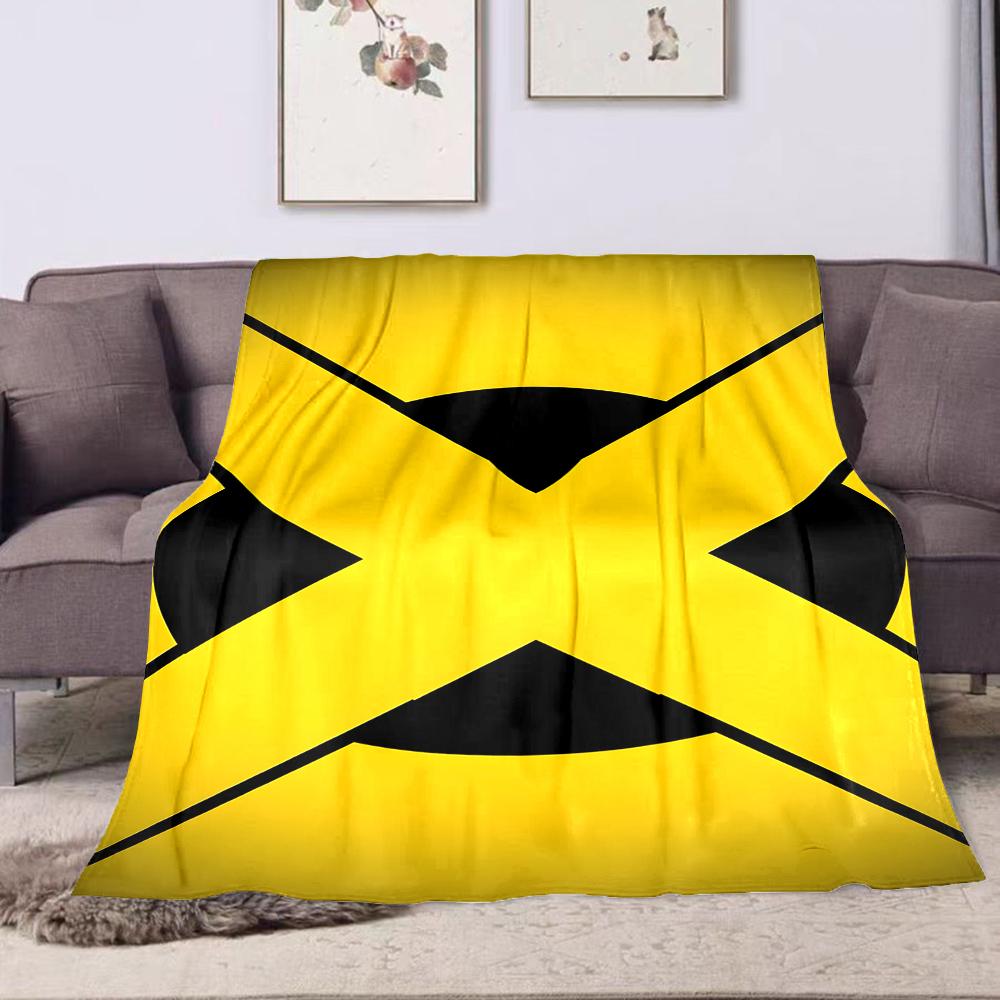 Yellow X Symbol on Black Oval Background Patterned flannel blanket perfect for the bedroom living room, sofa, or a little nap