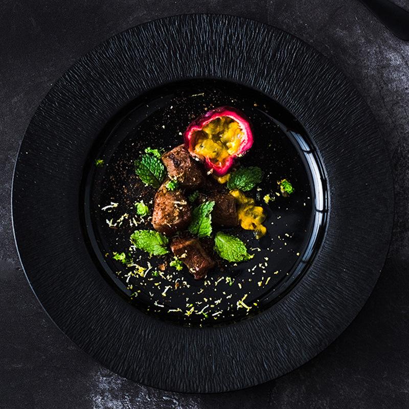 Japanische schwarze Steakplatte Xiaohongshu Gleiche westliche Speiseplatte Hotel Kommerzielle Kochplatte Pastaplatte Keramikgeschirr