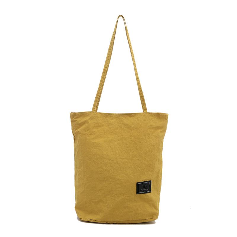 

Japanese lazy style casual solid color large-capacity nylon cloth bag women s summer simple and light commuting shoulder bag tide жёлтый