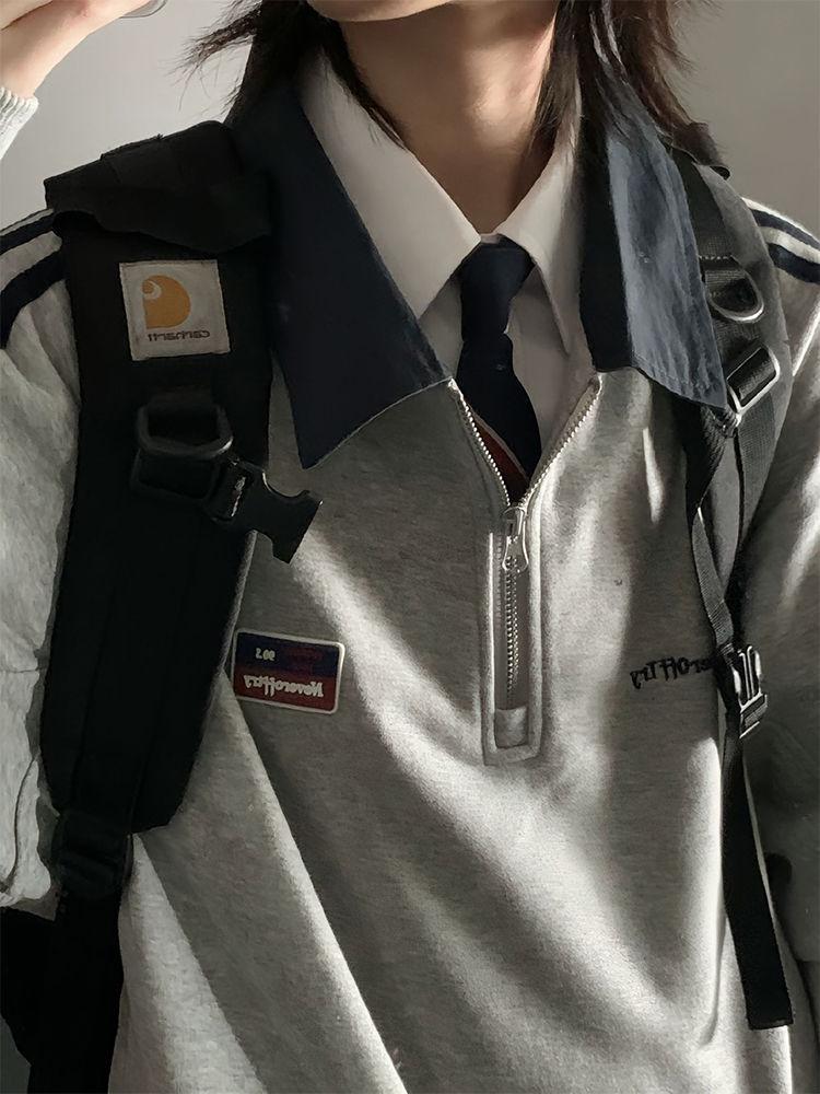 Damska bluza retro z półzapięciem na zamek i kołnierzykiem polo - styl college'owy, luźny krój na jesień/zimę 2025