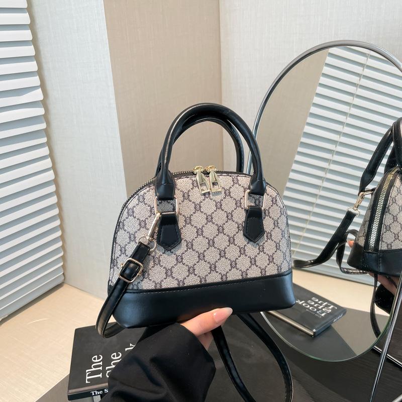 

Повседневная мода темперамент иностранный стиль новая сумочка женская ракушка ретро кэжуал личность нишевый дизайн сумка мессенджер чёрный