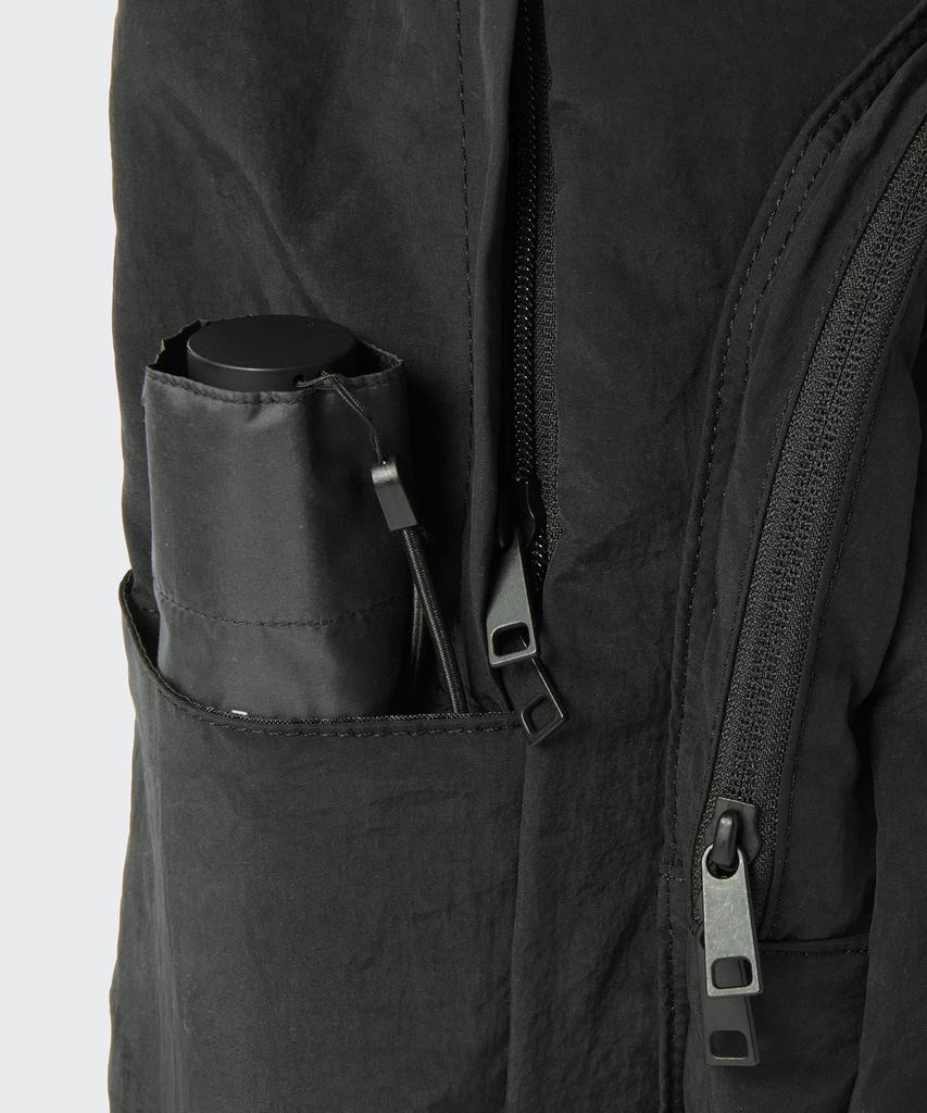 Musinsa Standard Crinkle Round Pocket Backpack [Black]