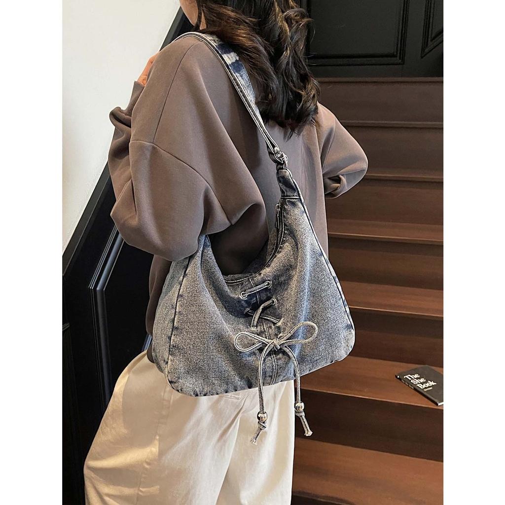 Lässiger Stil große Kapazität Umhängetasche 2026 neues Nischen-Design Jeansstofftasche Premium-Textur Crossbody-Tragetasche