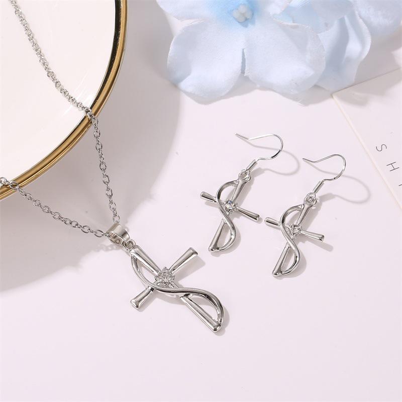 

Stylish Cross Pendant Earrings and Necklace Set with Diamonds