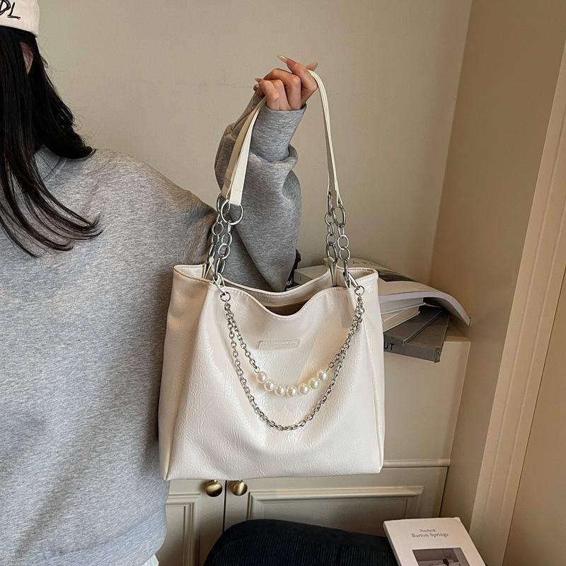 Borsa a tracolla da underarm ultra-alla moda, di nicchia, minimalista, ad alta capacità, nuova borsa tote da pendolare