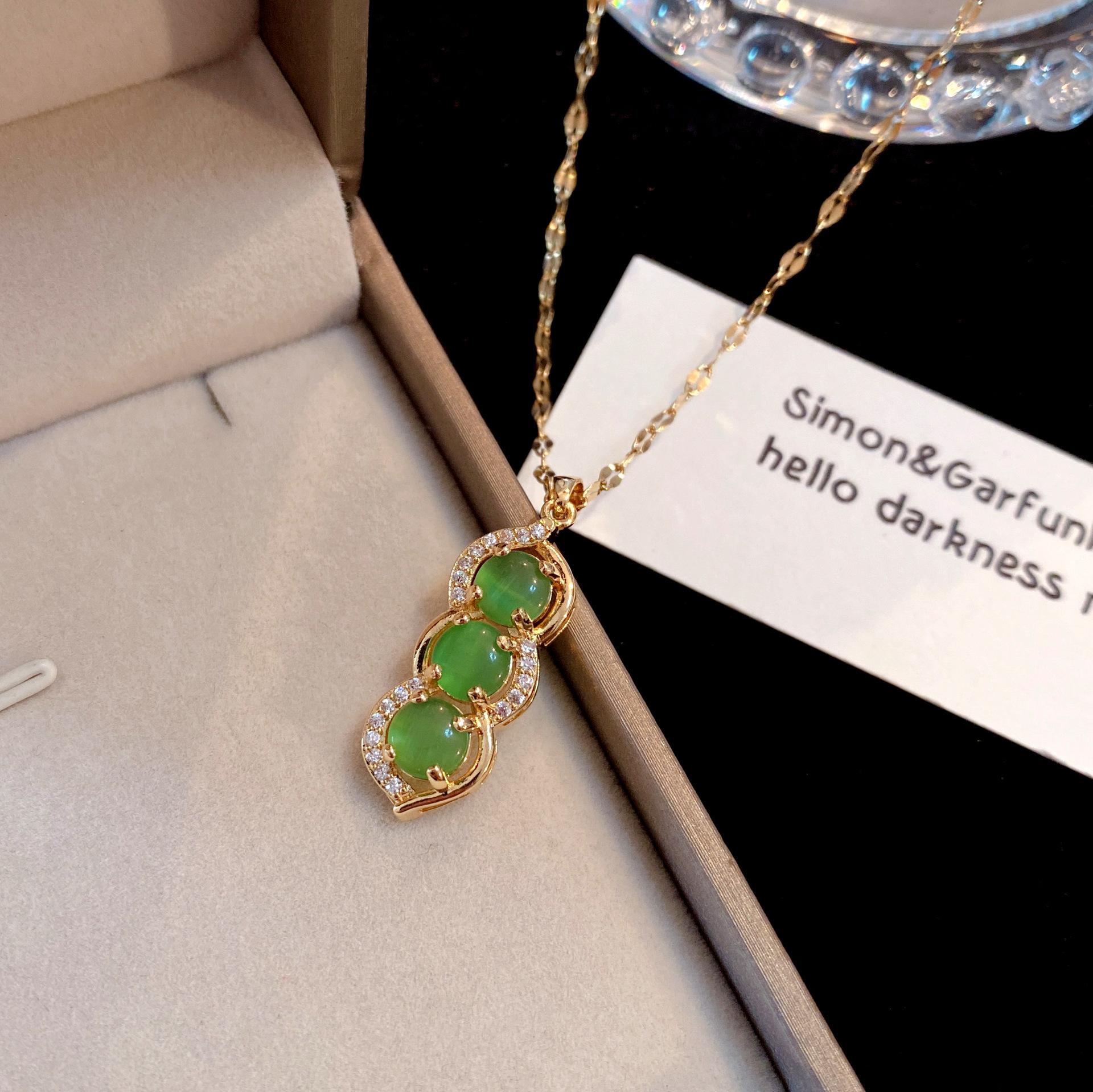 

Женское новое популярное ожерелье с подвеской в ​​виде арахиса, модное универсальное бриллиантовое ожерелье, ожерелье с зеленым шариком 50cm золотой