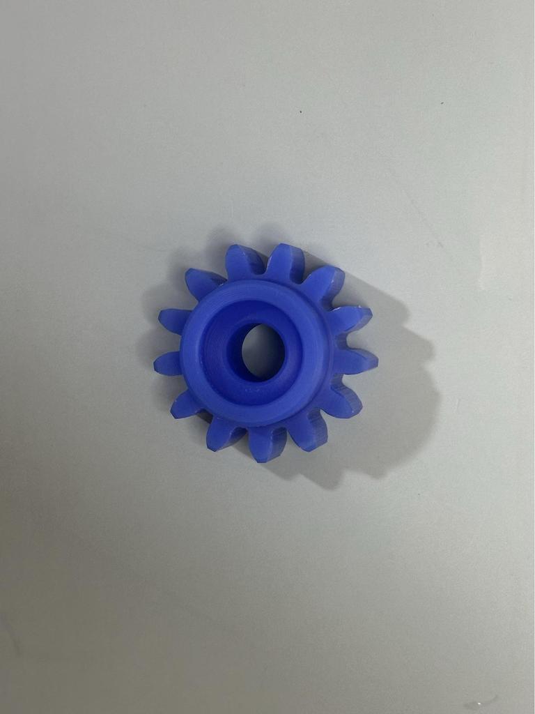 Xizhuo Punching Machine Accessories: Turbine Worm Gear, Rubber Roller, Bracket, and Brush Holder.