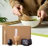 This 4-piece tea ceremony set includes a tea whisk, a 100-piece tea whisk holder, a straightening tool, a tea scoop, and a matcha bowl. It's compact a
