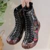 Autumn and winter new flat-bottomed beef tendon sole women's boots leather printed medium tube Martin boots warm and comfortable cotton shoes women