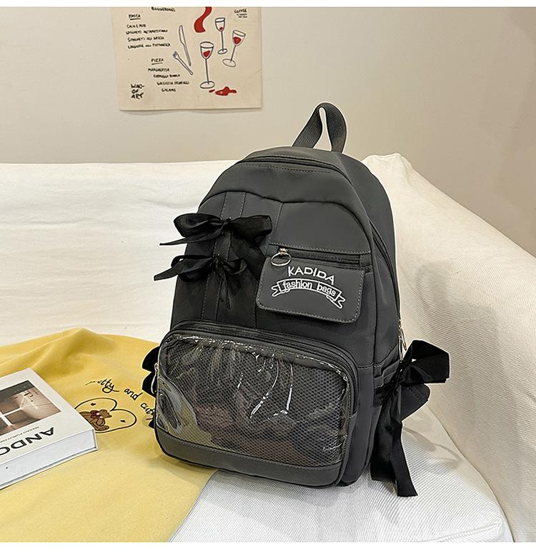 Bow schoolbag female corduroy junior high school students primary school students Internet celebrity backpack large capacity niche backpack