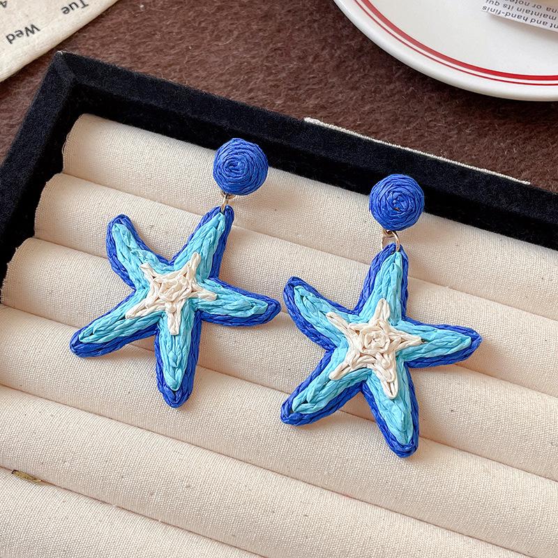 

Steel needle bohemian raffia woven starfish earrings sweet and delicate personality earrings seaside travel earrings