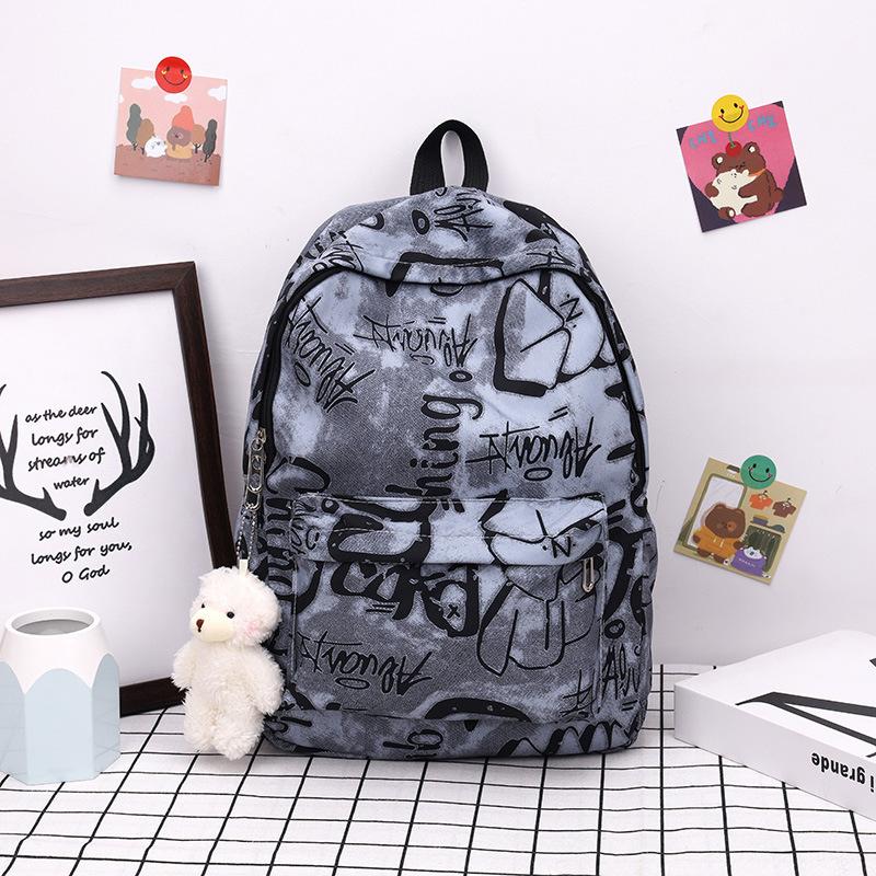 Sac à dos scolaire sac à dos mode et simple sac à dos pour élèves du collège et du lycée japonais version coréenne sac à dos Mori sac à dos tendance graffiti