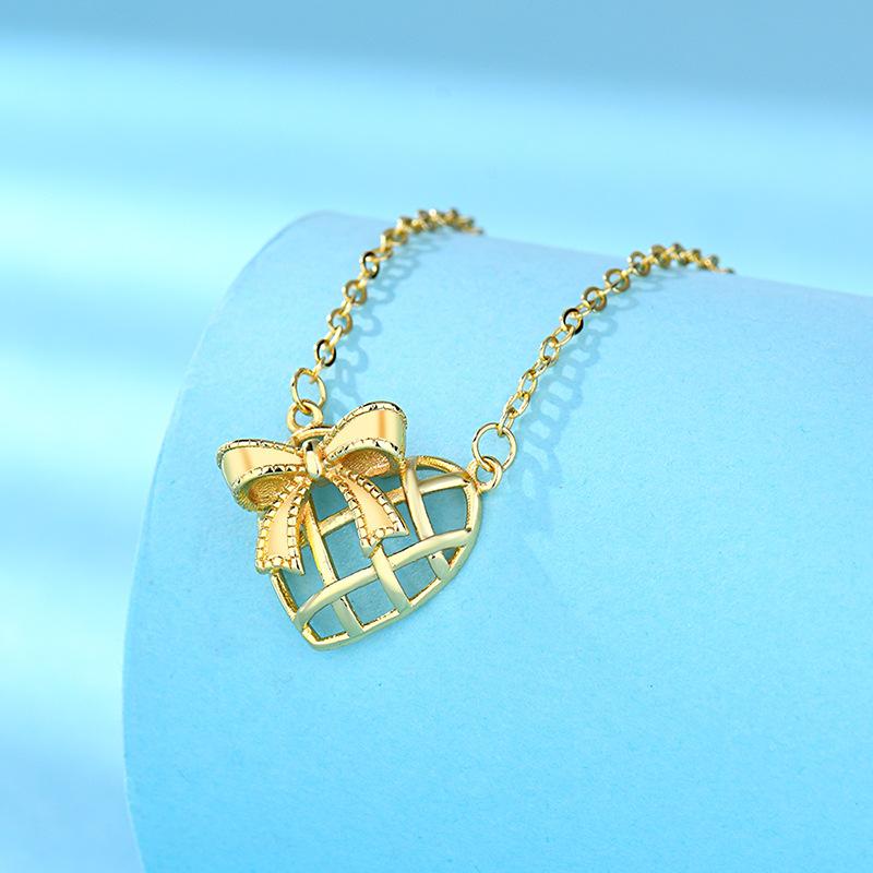Golden Bow Hollowed-out Love Necklace for Women In Summer Temperament Simple Japanese and Korean Collarbone Chain