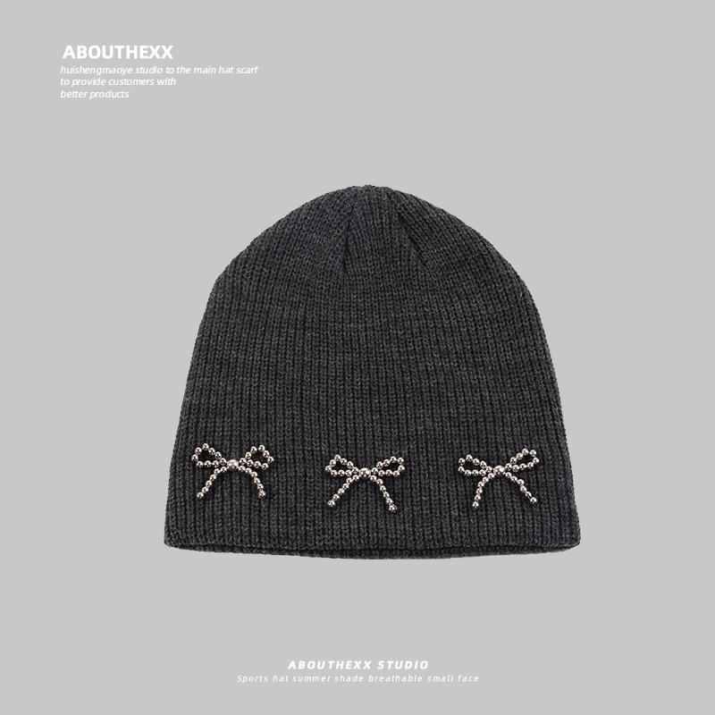 Korean Niche Hat Women's Bow Knitted Woolen Hat Autumn and Winter High End Cold Hat Warm and Versatile Ear Protection Hat Trend