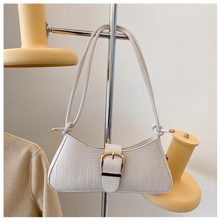 

Французская текстура популярная сумка белая сумка подмышки женская 2024 новая модная однотонная французская нишевая портативная сумка-багет белый