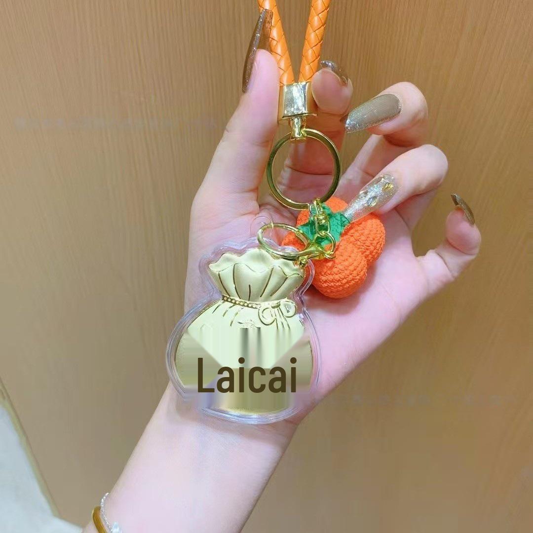 

Golden Lucky Bag Phone Pendant: Cute Cartoon Keychain & Lanyard Accessory