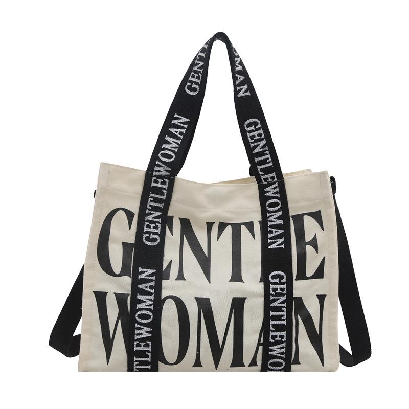 2025 Women's Color-Blocking Canvas Handbag: Trendy Crossbody & Shoulder Bag with Colorful Strap